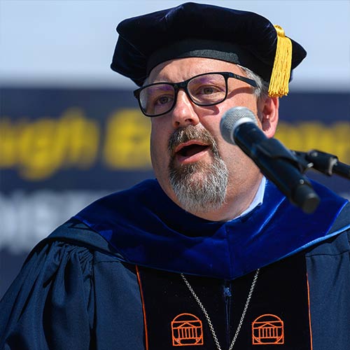 Dr. Michael Thomas addressing the graduates